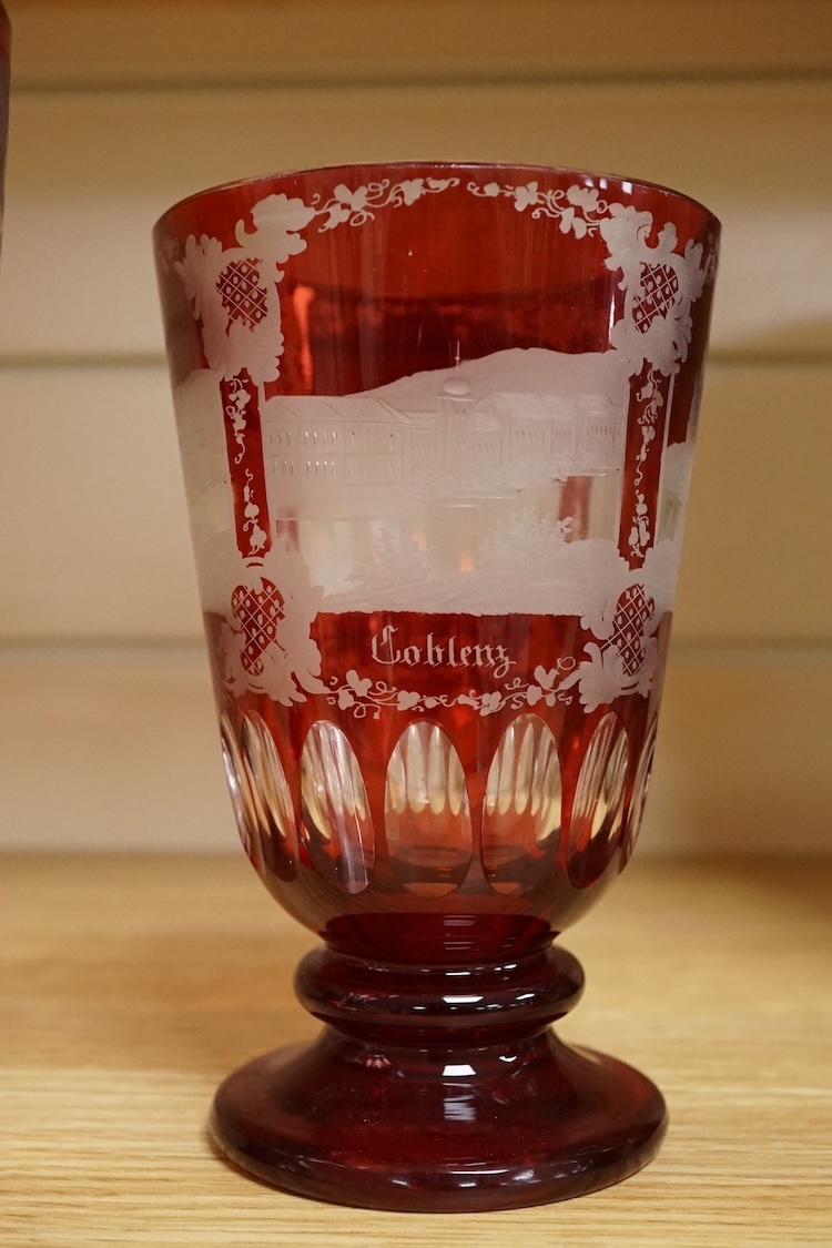 Three Bohemian topographical engraved ruby flashed spa glasses, late 19th century, largest 16cm high